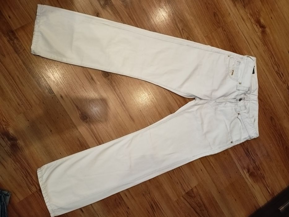 Spodnie  przecierane.easy fit . Emporio Armani jeans