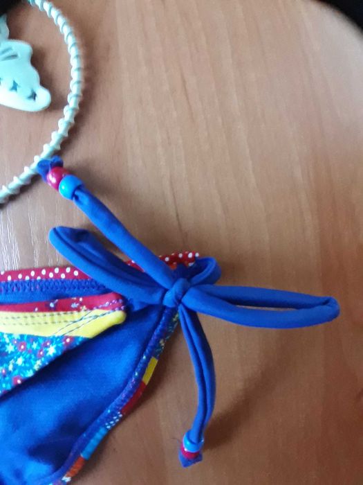 Яскраві плавки від купальника, 12 розмір.
Red Herring