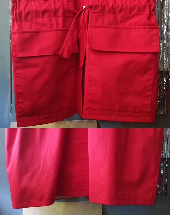 Жіночий жилет-сукня карго з коміром-стійкою яскраво червоного кольору.