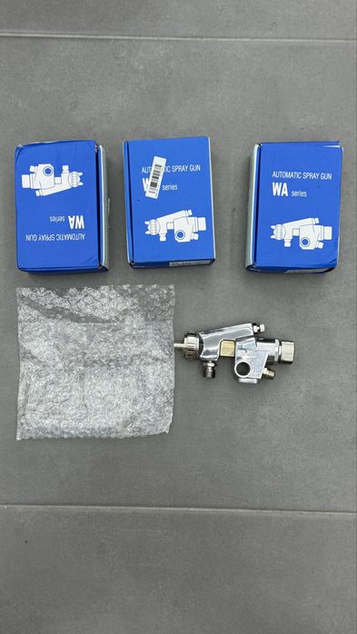 Pistola de cola e tinta vaporizda