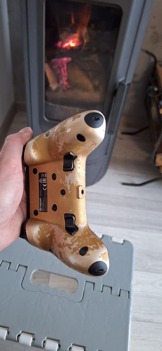 Naco rewolution pro controler. Pad Ps4