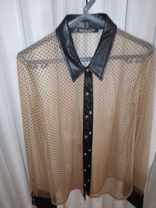 Blusa transparente swallow