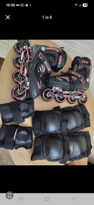 Продам ролики ,наколінники, шолом