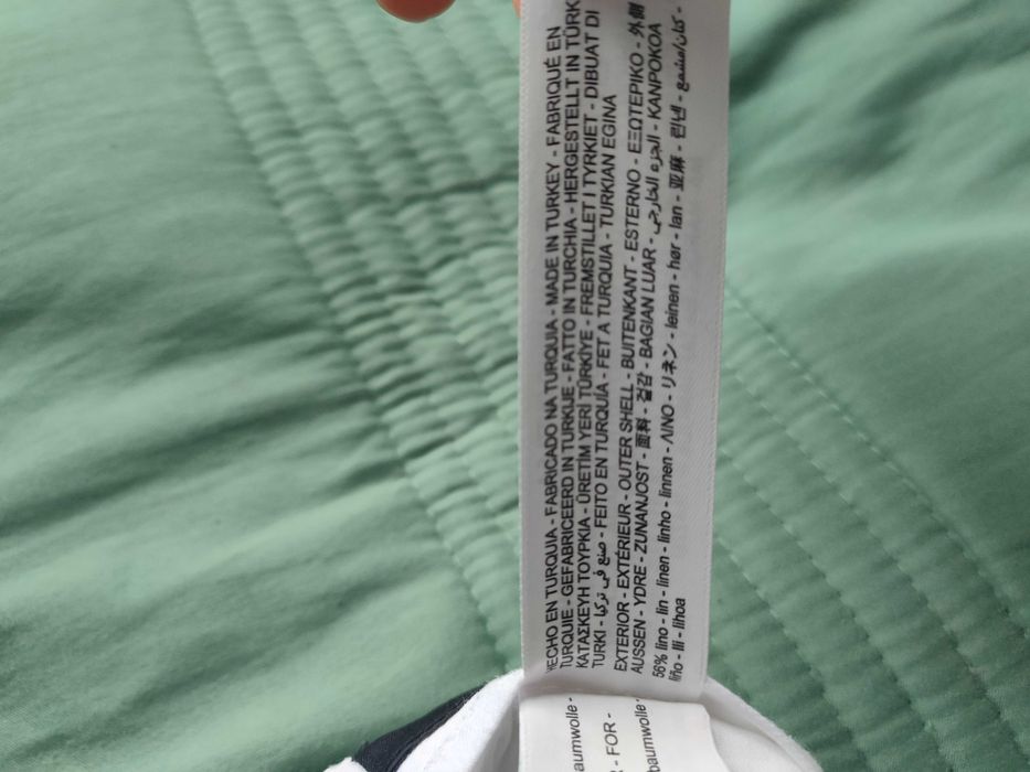 Lniane spodnie męskie Massimo Dutti w kolorze białym, idealne na lato.