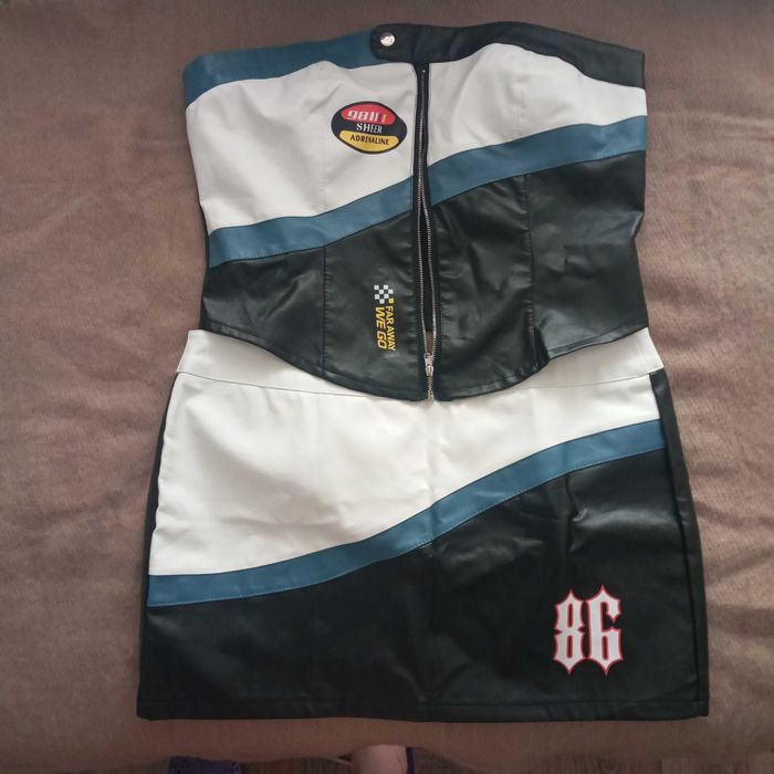 шкіряний костюм топ і спідниця