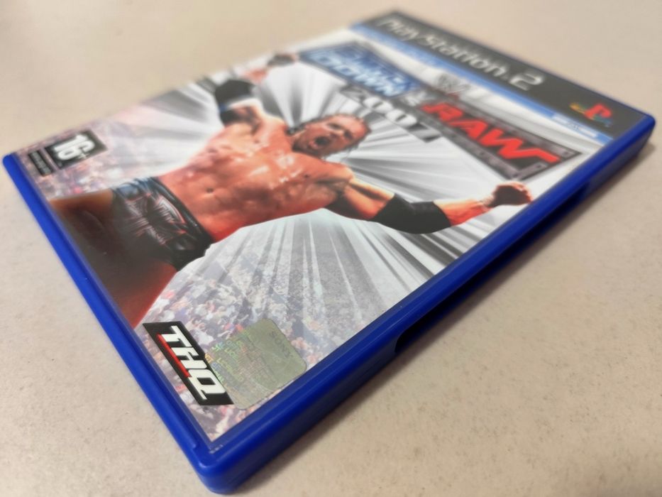 Jogo para PlayStation 2 (PS2) - Smack Down vs Raw 2007