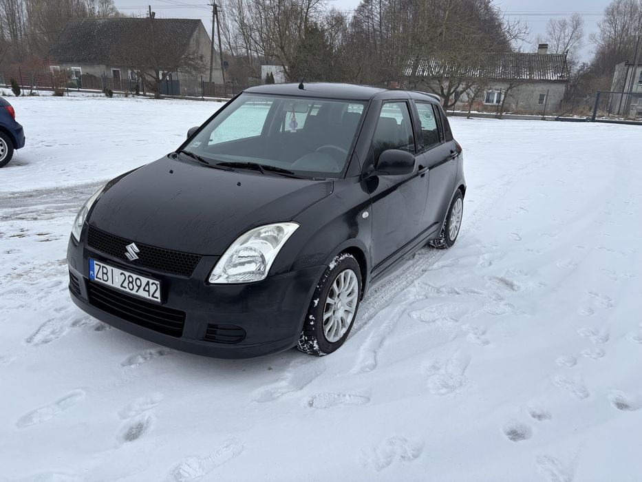 Suzuki Swift 1.3 benzyna 2009 klima,2 komplety kół,130.000 km przebieg
