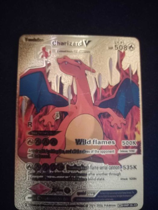 złota karta pokemon charizard