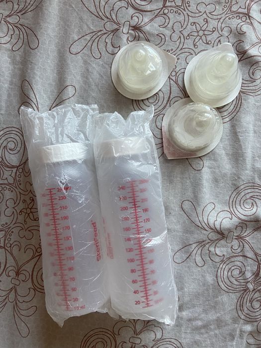 Нова пляшечка для годування .