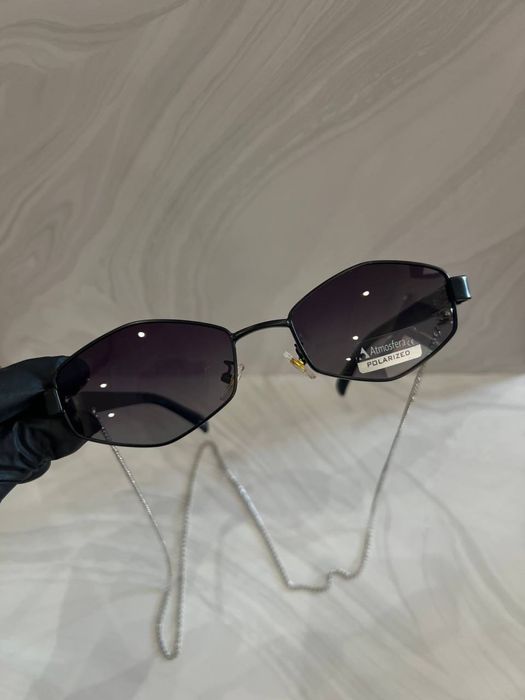 Солнцещащитние очки, сонцезахисні окуляри