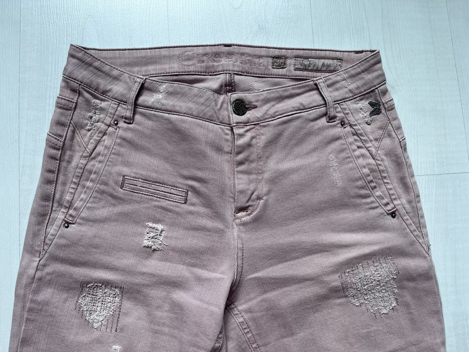 Jeansy brudny róż