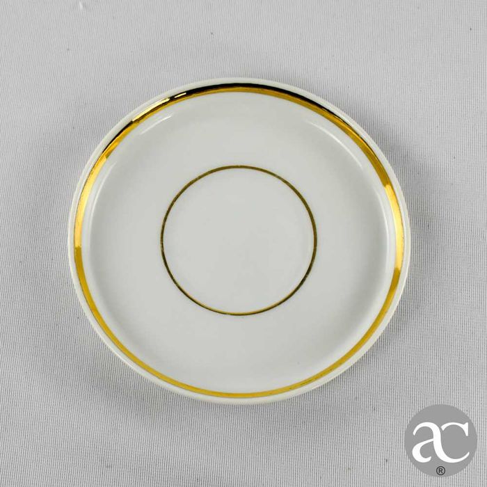 Taça e pires em porcelana Artibus, com friso a ouro