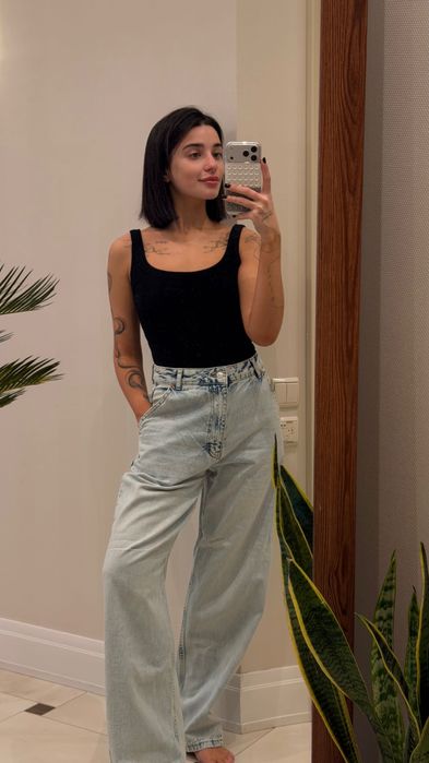 Світлі джинси вільного крою