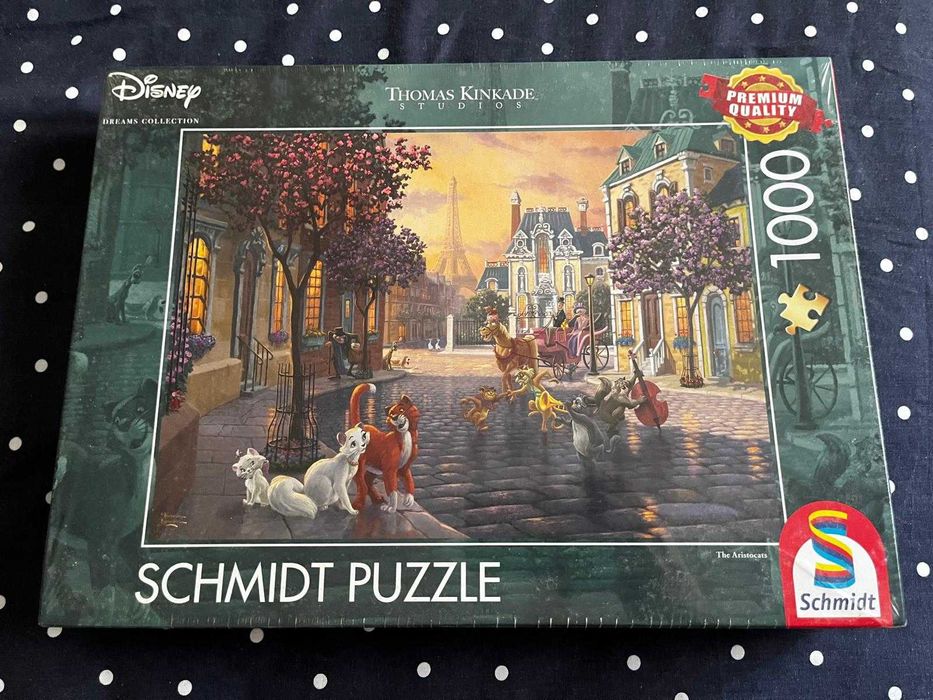 Puzzle Schmidt - Disney por Thomas Kinkade: 1000 peças; 4x 500 peças (Pequena Sereia, Aristogatos, Pocahontas, 101 Dálmatas, Rei Leão, Peter Pan)