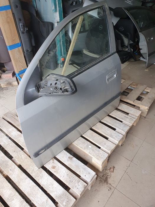 Двері   опель   астра   ж