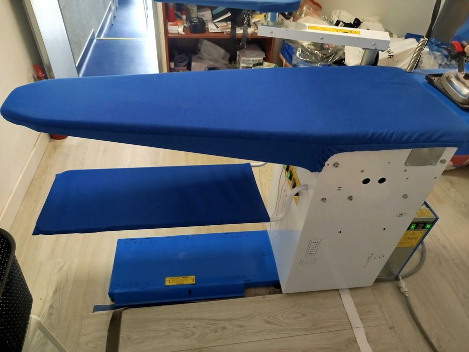 Máquina de engomar.
