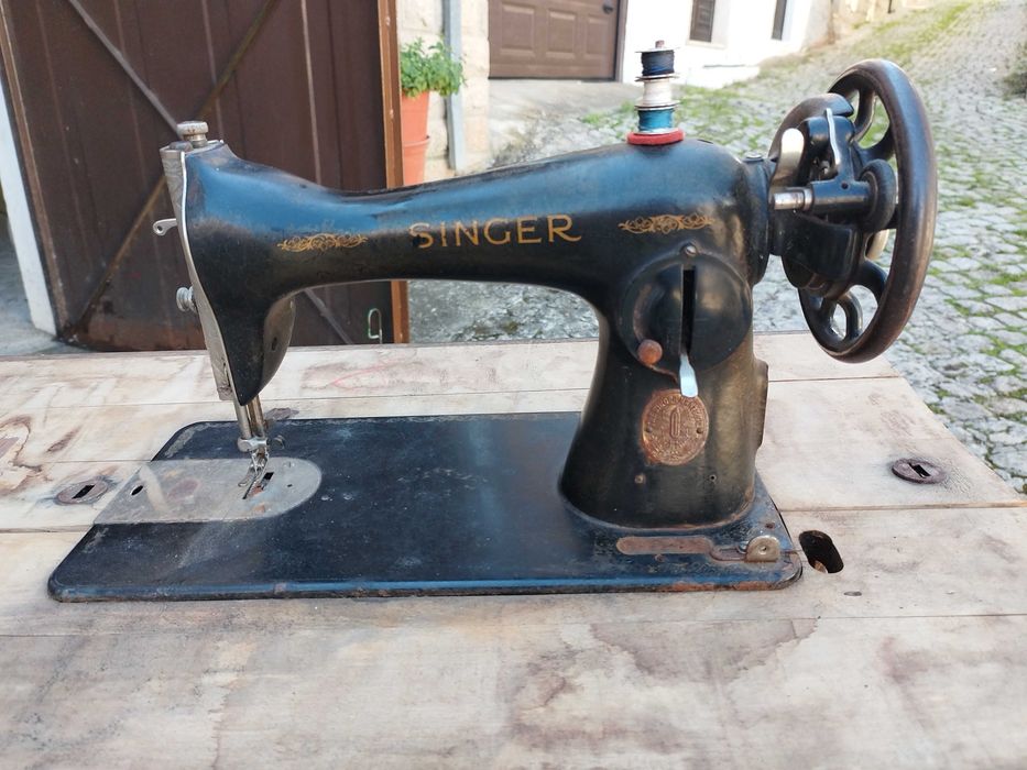 Máquina de costura singer