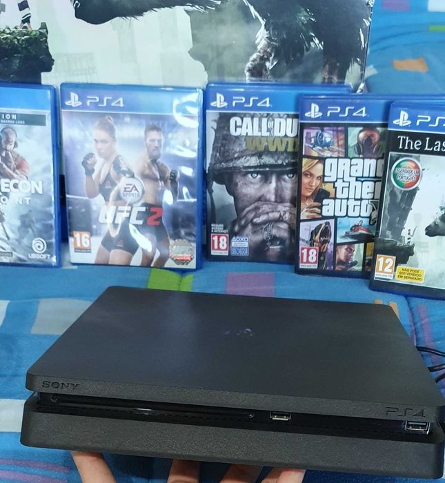Ps4 slim 1Tb + 5 jogos