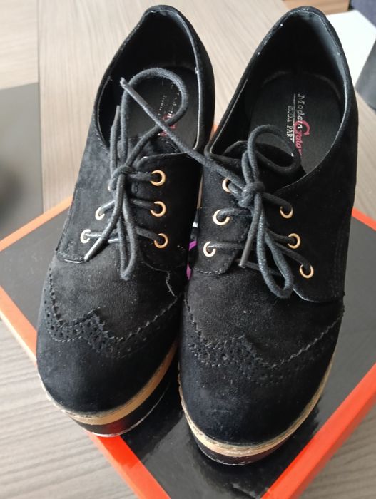 Sapatos sola alta