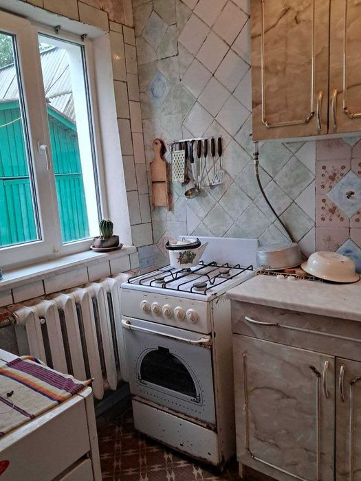 Продам 1/2 дома на Салтовке в районе парка Победы.