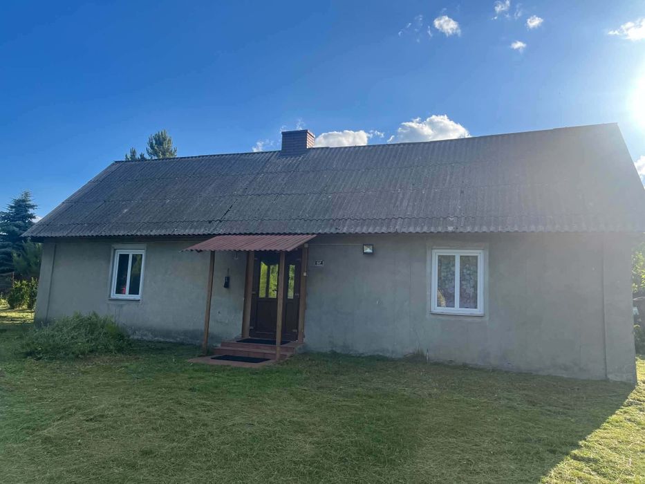 Działka z domem .