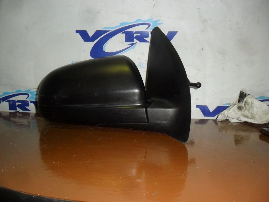 Espelho retrovisor direito manual Chevrolet Aveo 2010