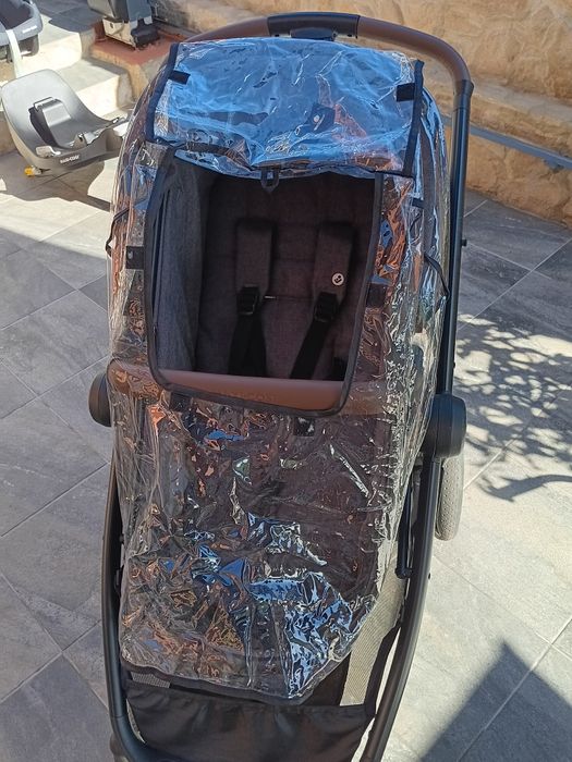 Cadeirinha de bebé.