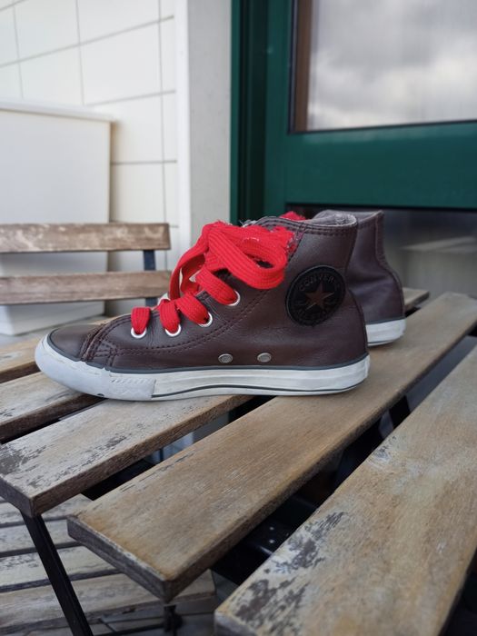 Sapatilhas Converse All Star em Pele