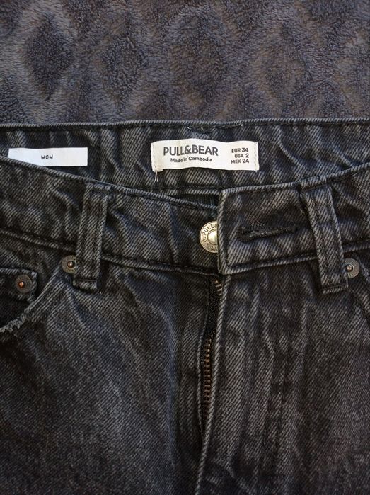 Dżinsy z dziurami XS