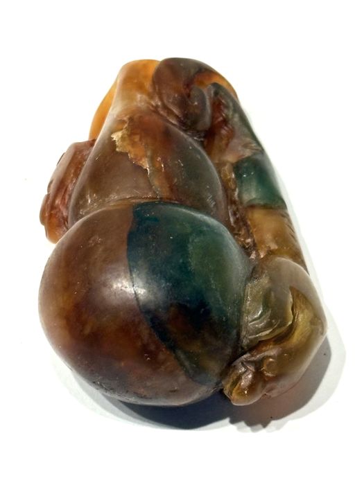 Beautiful vintage Asian sculpture carved from multicolored jadeite