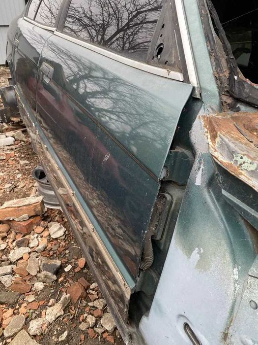 Права передня дверь бмв е34 до рест добрий стан