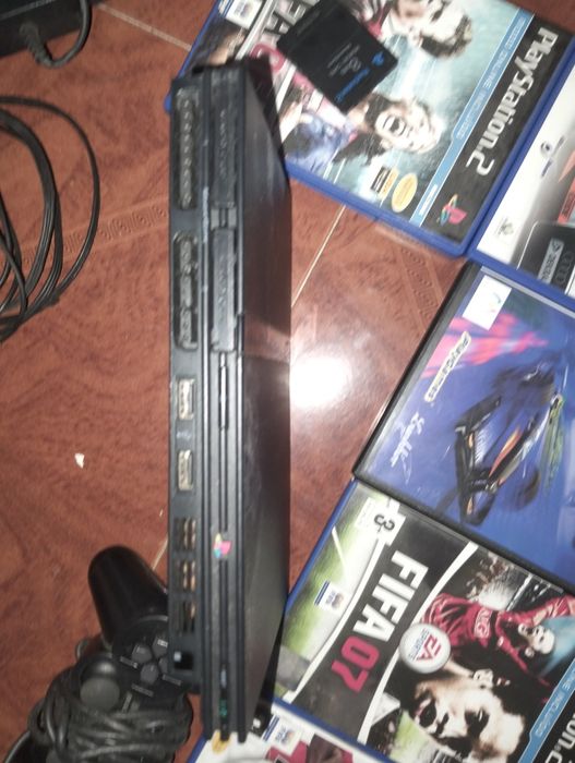 Ps2 com comandos, cabos, jogos, e cartão de memória64552969992835124