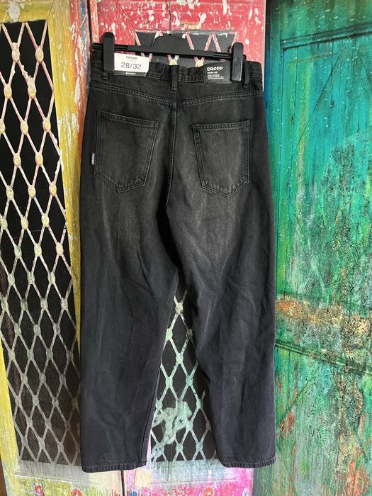 Nowe czarne męskie spodnie jeansowe z dziurami loose baggy Cropp denim