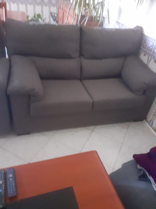 sofás com pousa pés