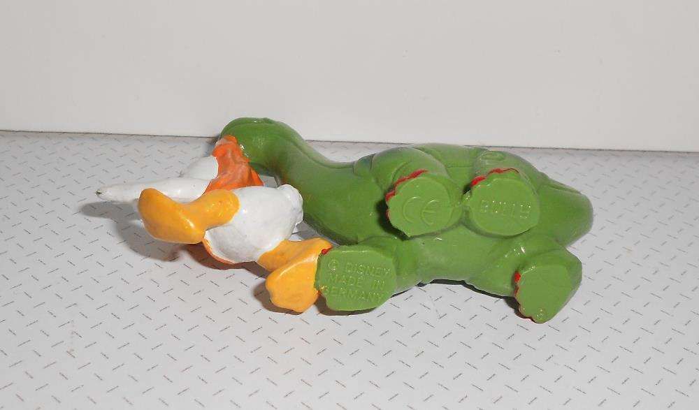 Boneco figura PVC Pato Donald dinossauro