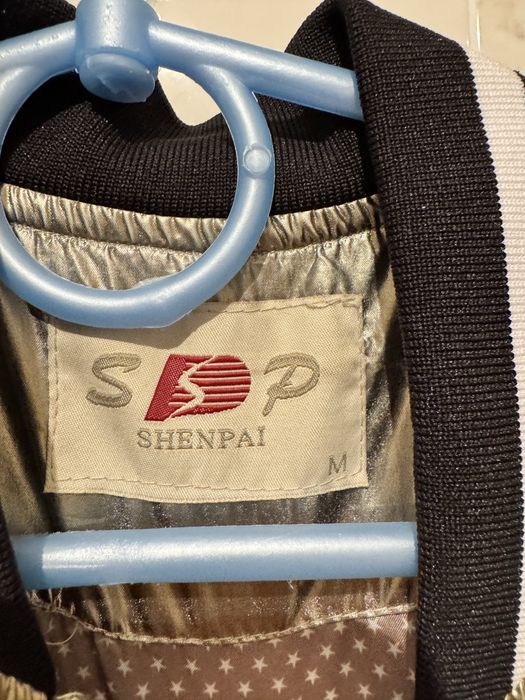 Золотистий бомбер