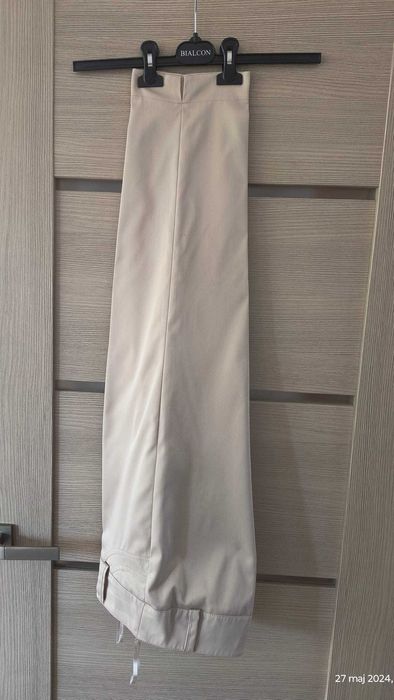 Spodnie 7/8 jasnobeżowe. Rozm. 48