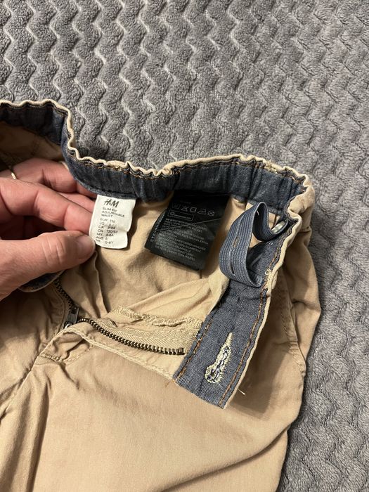 Spodnie eleganckie kremowe HM slim fit beżowe 116 chłopięce