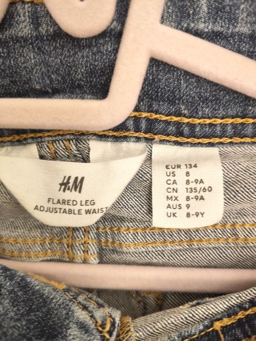 H&M spodnie dżinsy dzwony flared leg, 134