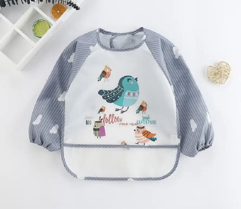 Дитячі нагрудники, фартушки, слинявчики для їжі/творчості