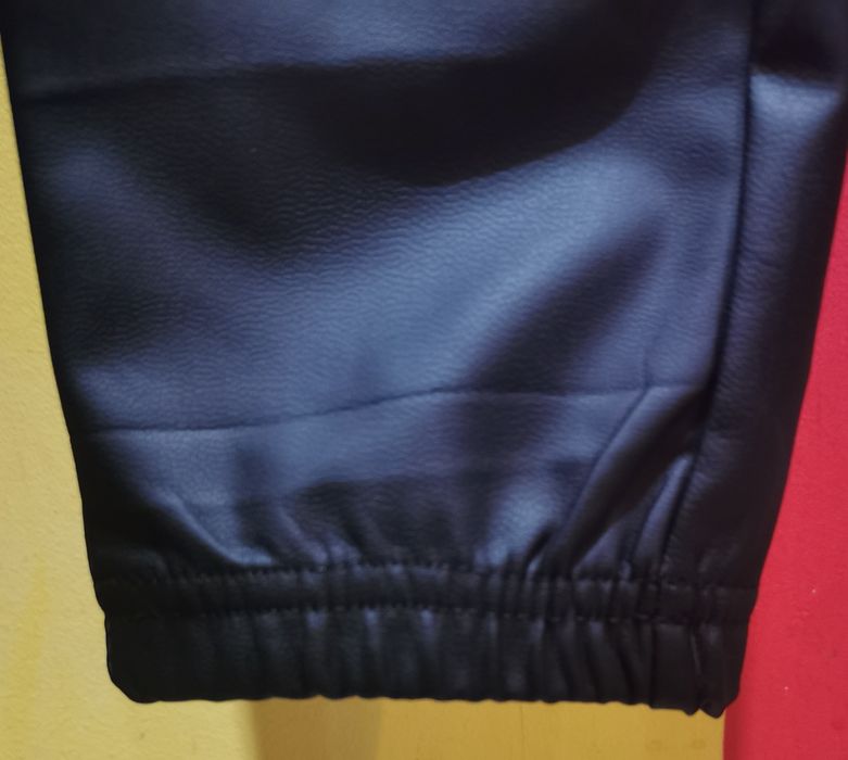 Spodnie eko skórka kieszonki