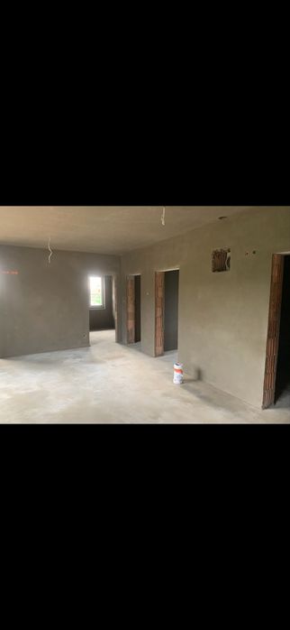 Tynki maszynowe tradycyjne cementowo wapienne zacierane na gladko