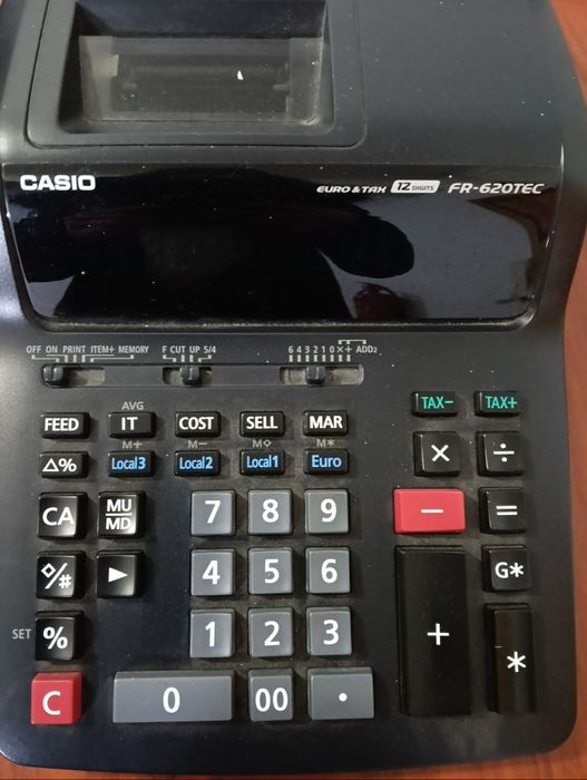 Máquina de calcular Casio com rolo