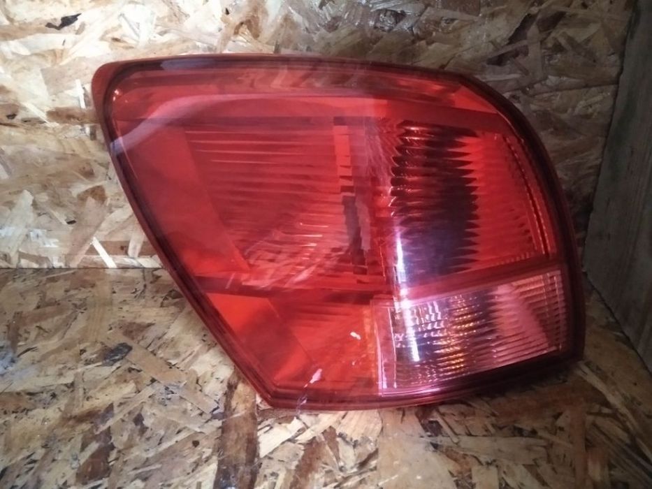 FAROLIM NISSAN QASHQAI 07-09 - ESQUERDO / DIREITO