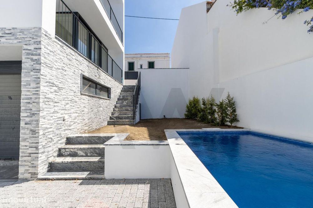 moradia para venda com jardim e piscina
