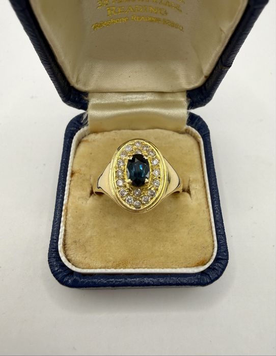 Złoty pierścionek 750 z szafirem 0,50ct i diamentami 0,25ct