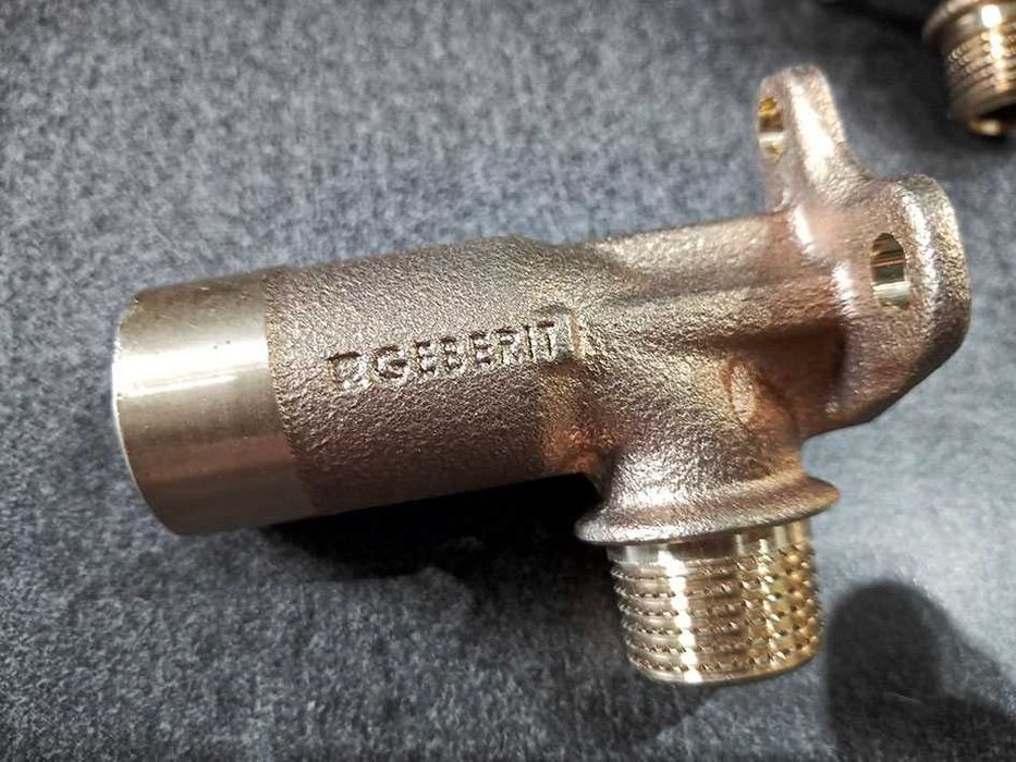 Geberit Mepla kolano z łapą 1/2 73 mm