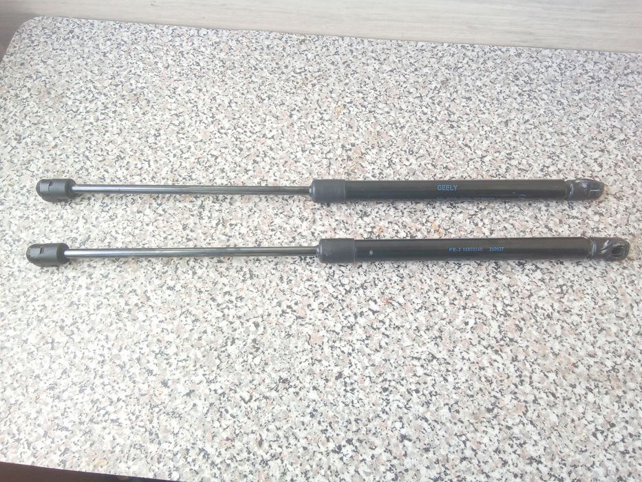 Амортизатори багажника джили емгранд ЕС7-RV