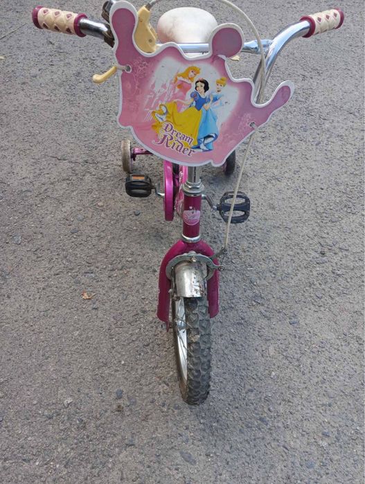 Дитячий рожевий велосипед