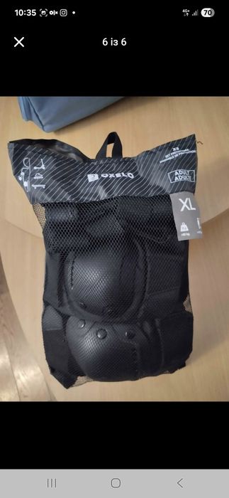 Продам ролики ,наколінники, шолом